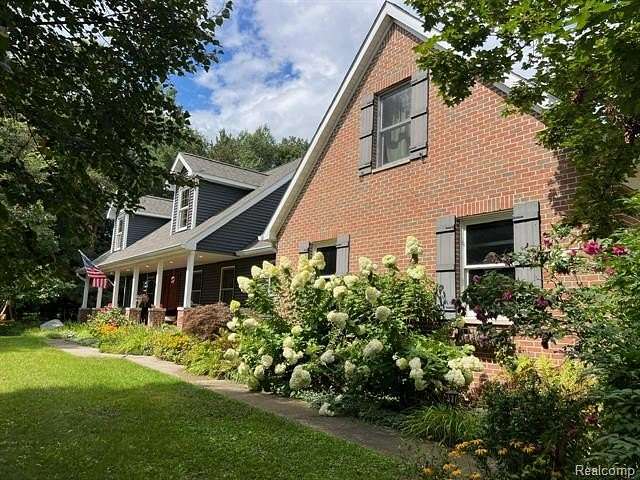 2.5 Acres of Residential Land with Home for Sale in Arcadia Township, Michigan