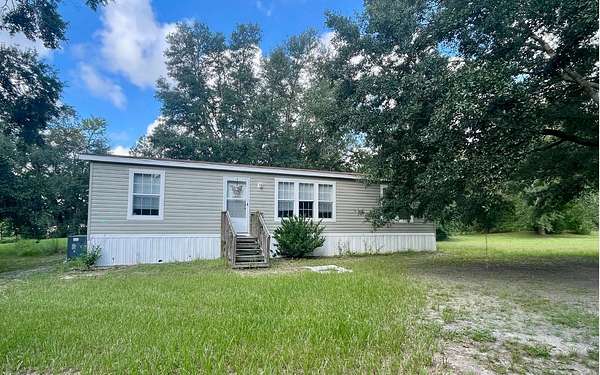 2.54 Acres of Residential Land with Home for Sale in Lake City, Florida