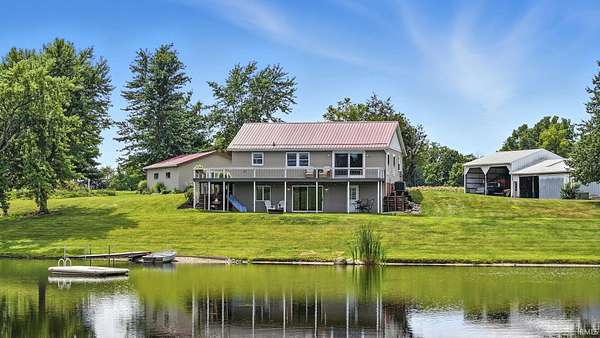 15.6 Acres of Land with Home for Sale in Columbia City, Indiana