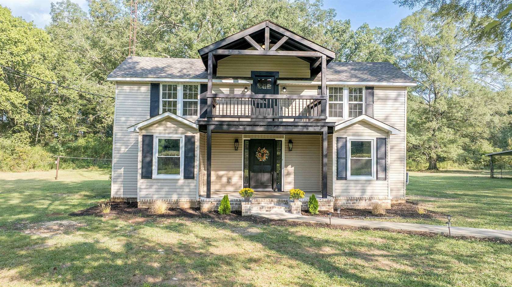 6.6 Acres of Residential Land with Home for Sale in Florence, Alabama