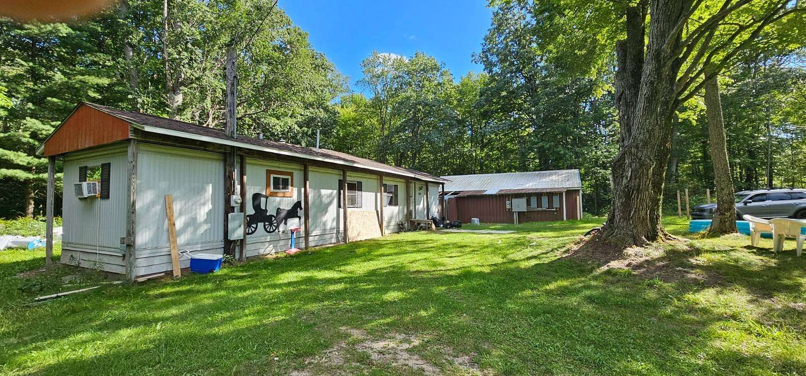 8 Acres of Residential Land with Home for Sale in Lake City, Michigan