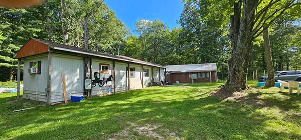 8 Acres of Residential Land with Home for Sale in Lake City, Michigan