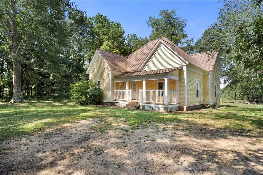 13.4 Acres of Land with Home for Sale in Bowdon, Georgia