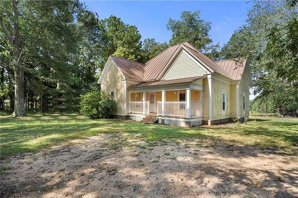 13.4 Acres of Land with Home for Sale in Bowdon, Georgia