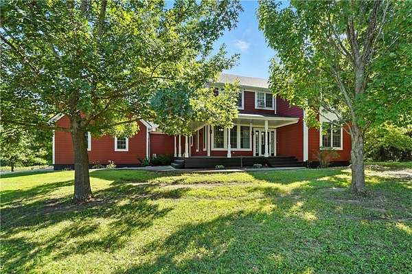 18 Acres of Land with Home for Sale in Harrisonville, Missouri