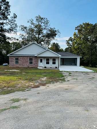 2 Acres of Residential Land with Home for Sale in Lufkin, Texas