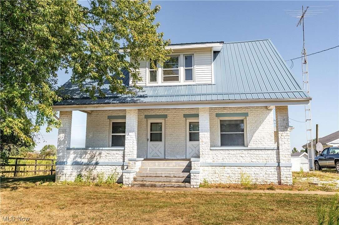 6 Acres of Land with Home for Sale in Paris, Ohio