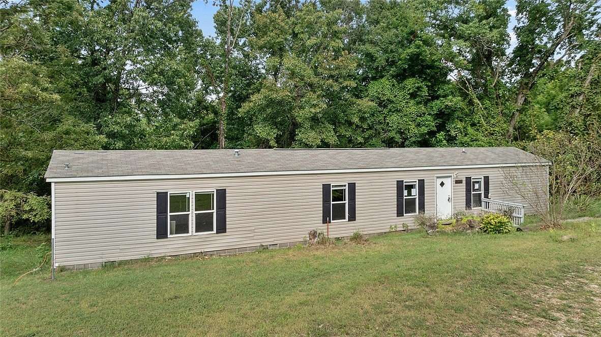 5 Acres of Land with Home for Sale in Garfield, Arkansas