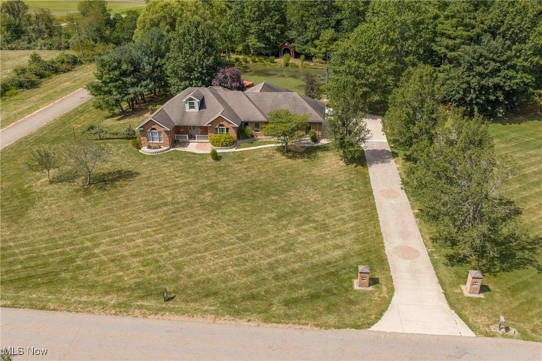 2.8 Acres of Residential Land with Home for Sale in New Philadelphia, Ohio