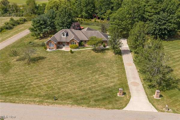 2.8 Acres of Residential Land with Home for Sale in New Philadelphia, Ohio