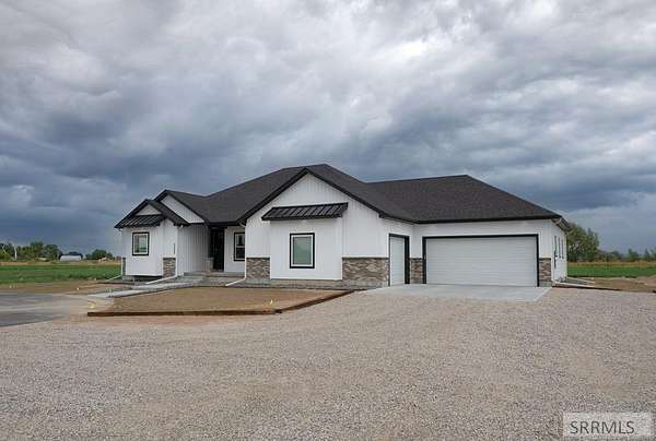 9 Acres of Residential Land with Home for Sale in Rigby, Idaho