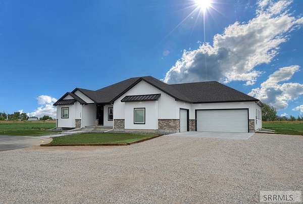 9 Acres of Land with Home for Sale in Rigby, Idaho