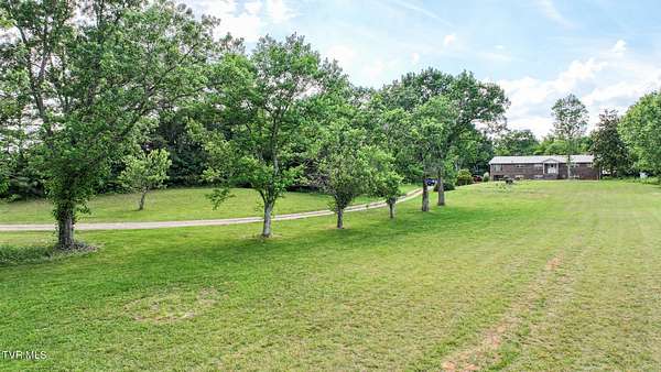 9.46 Acres of Land with Home for Sale in Chuckey, Tennessee