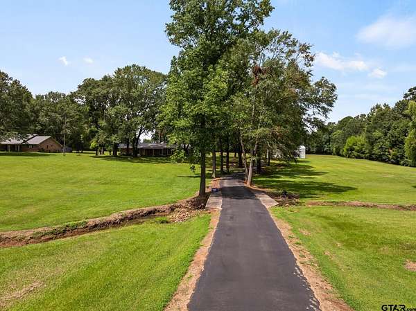 7 Acres of Residential Land with Home for Sale in Pittsburg, Texas