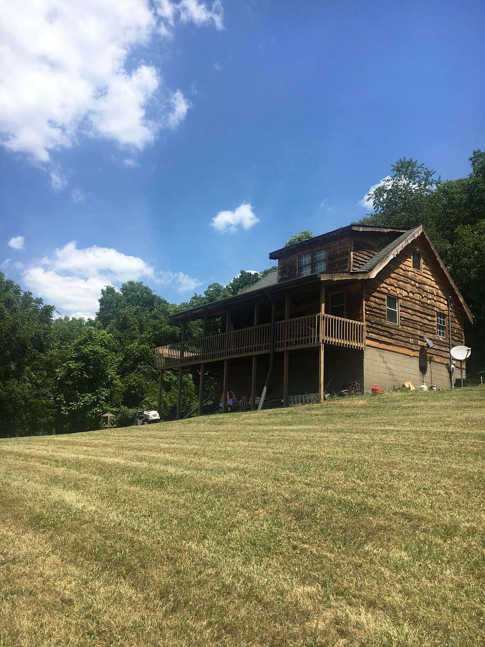 3.8 Acres of Land with Home for Sale in Graysville, Ohio