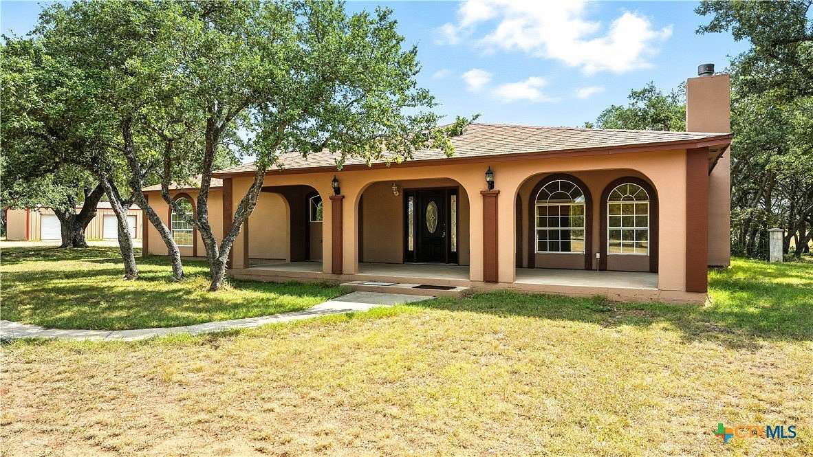 7.66 Acres of Land with Home for Sale in Driftwood, Texas