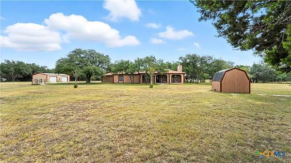 7.66 Acres of Land with Home for Sale in Driftwood, Texas