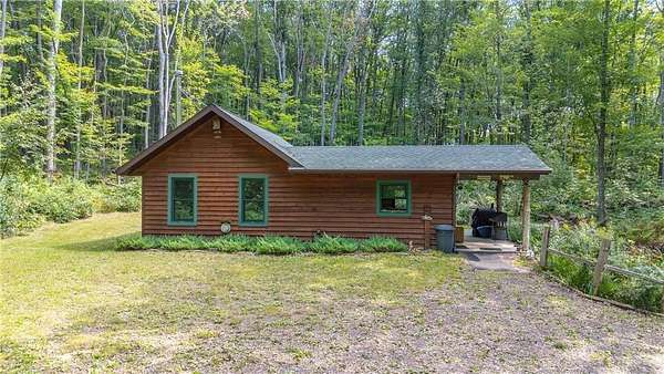 5 Acres of Residential Land with Home for Sale in Trego, Wisconsin