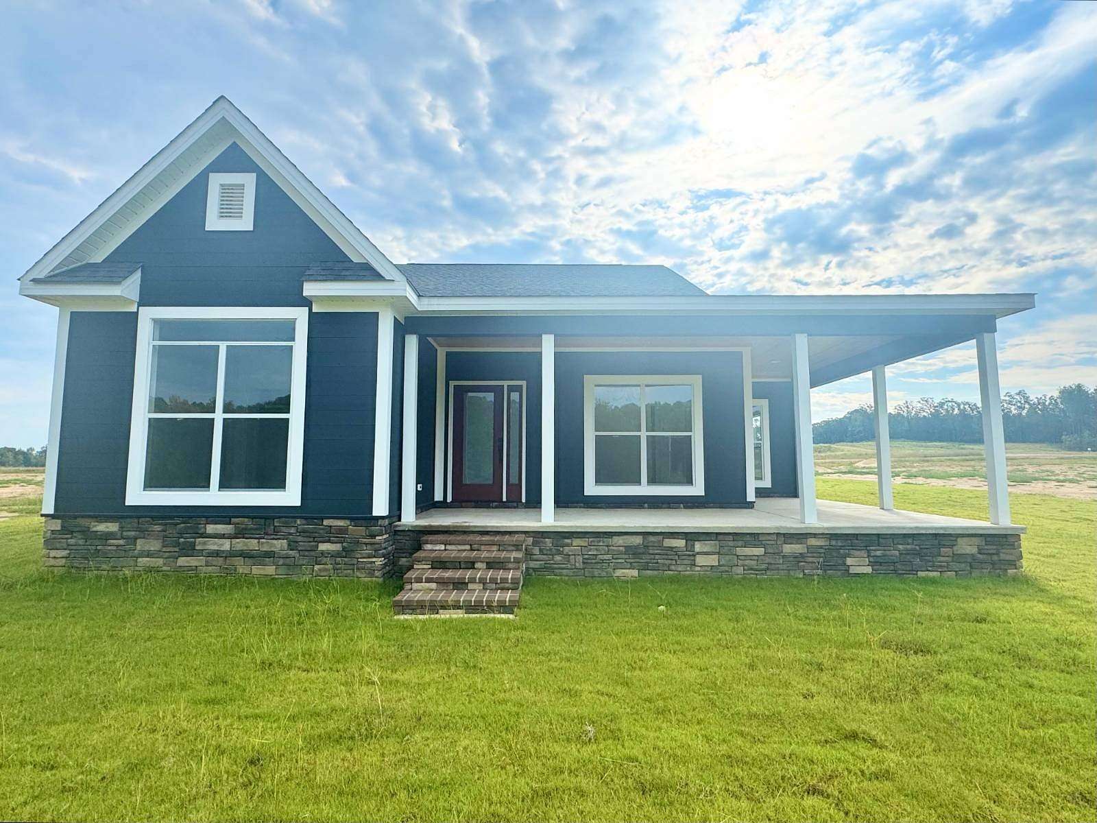 1.5 Acres of Residential Land with Home for Sale in Gore Springs, Mississippi