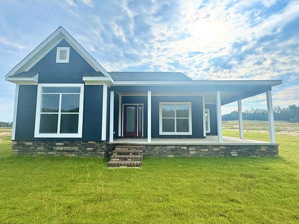 1.5 Acres of Residential Land with Home for Sale in Gore Springs, Mississippi