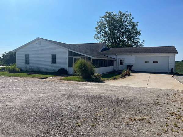 10.7 Acres of Land with Home for Auction in Waterloo, Indiana