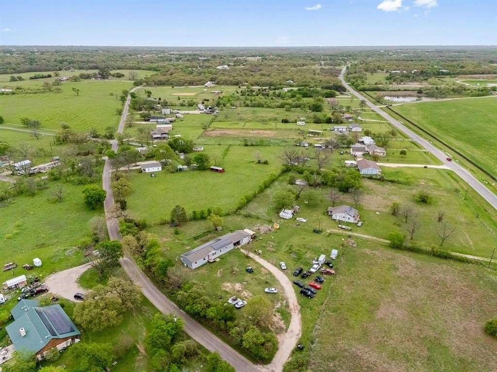 1.66 Acres of Residential Land with Home for Sale in Cleburne, Texas