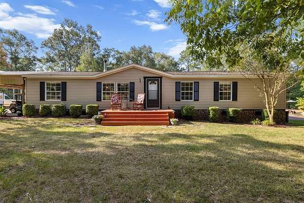 5 Acres of Residential Land with Home for Sale in Hallsville, Texas