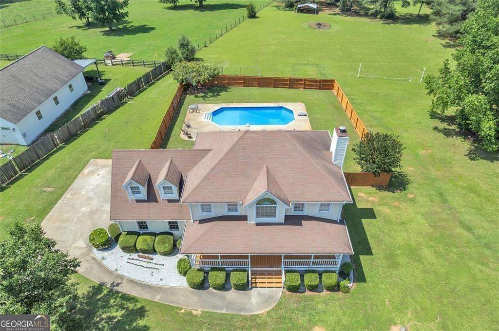 3.86 Acres of Land with Home for Sale in McDonough, Georgia