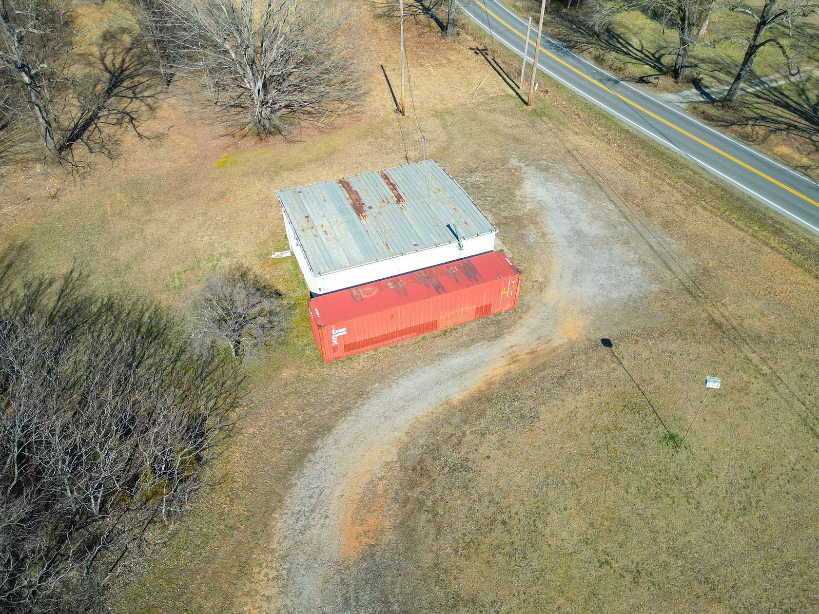 5.8 Acres of Improved Commercial Land for Sale in Charlotte, Tennessee