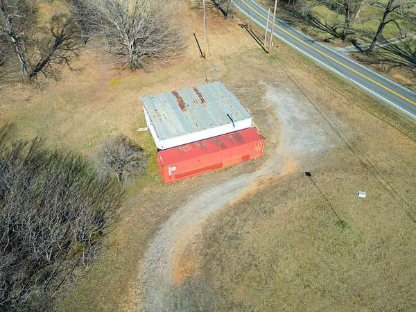 5.8 Acres of Improved Commercial Land for Sale in Charlotte, Tennessee