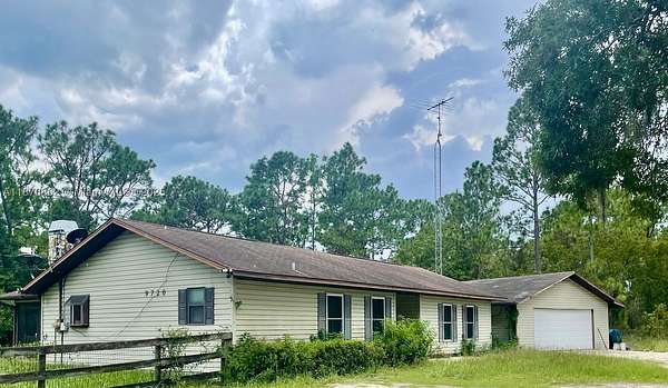 4.38 Acres of Land with Home for Sale in Dunnellon, Florida