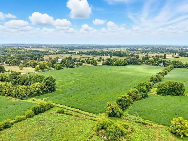 248 Acres of Agricultural Land with Home for Sale in Versailles, Kentucky