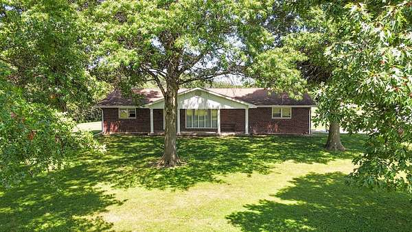 5 Acres of Residential Land with Home for Auction in Moberly, Missouri