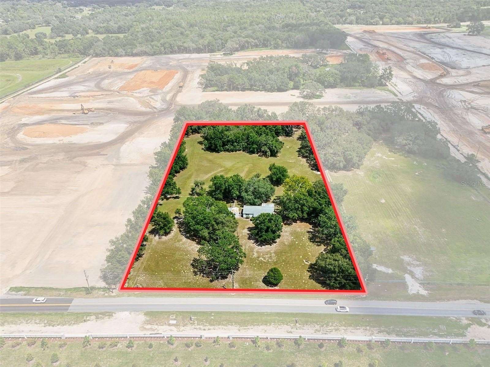 4.8 Acres of Residential Land with Home for Sale in Lady Lake, Florida