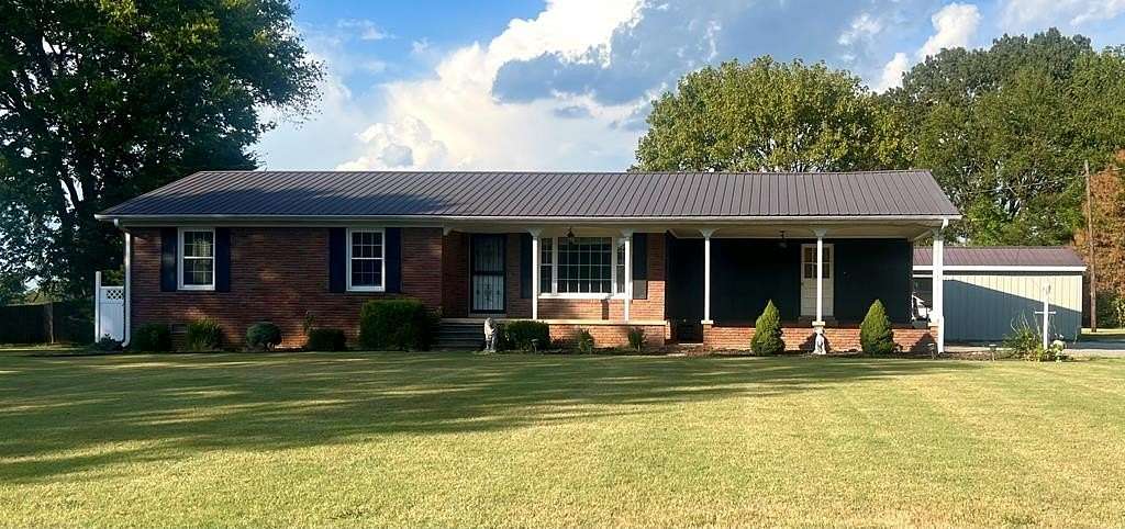 1.75 Acres of Land with Home for Sale in McKenzie, Tennessee