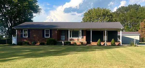 1.75 Acres of Residential Land with Home for Sale in McKenzie, Tennessee