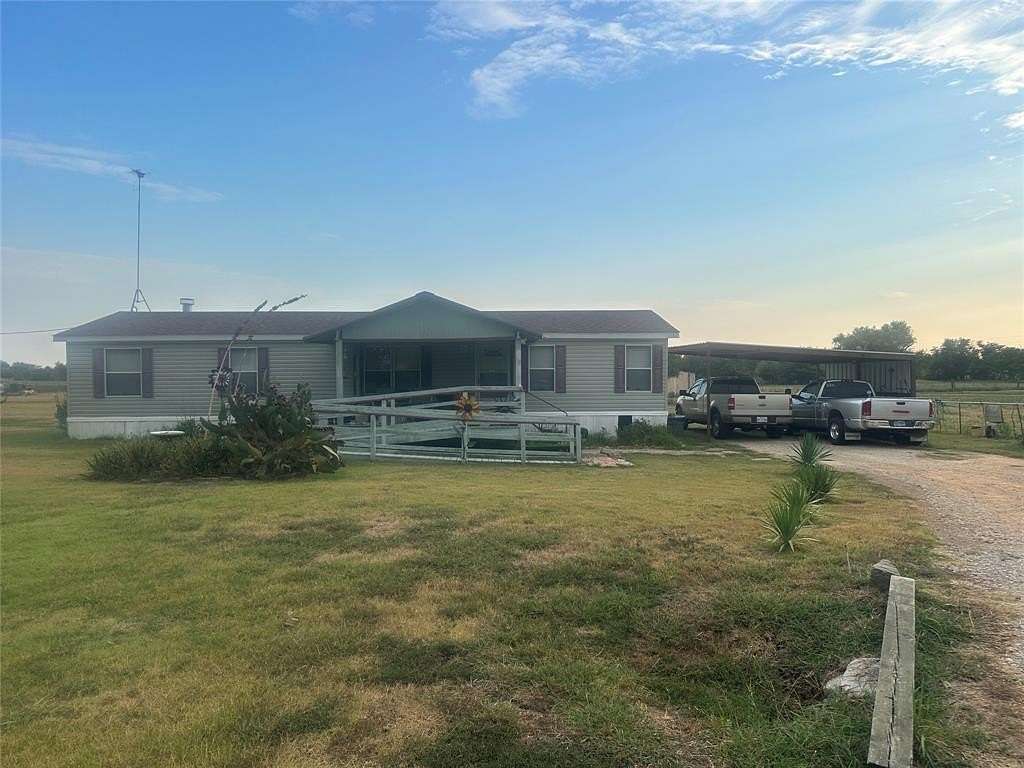 2 Acres of Residential Land with Home for Sale in Commerce, Texas