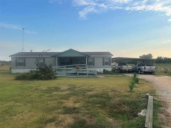 2 Acres of Residential Land with Home for Sale in Commerce, Texas