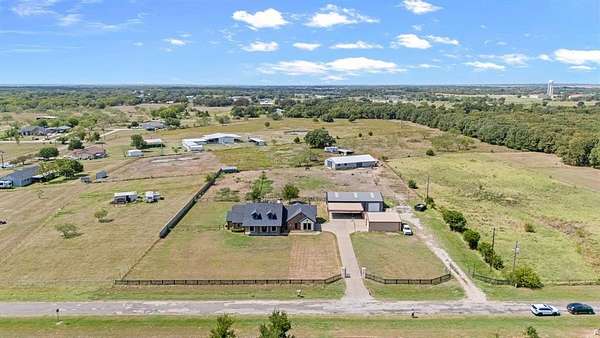 2.81 Acres of Residential Land with Home for Sale in Scurry, Texas