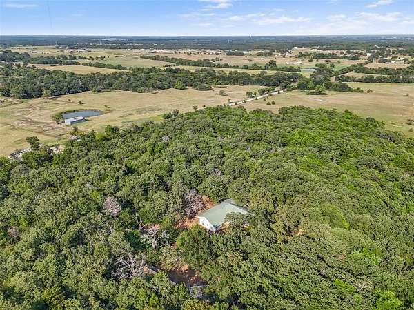 10.5 Acres of Land with Home for Sale in Collinsville, Texas