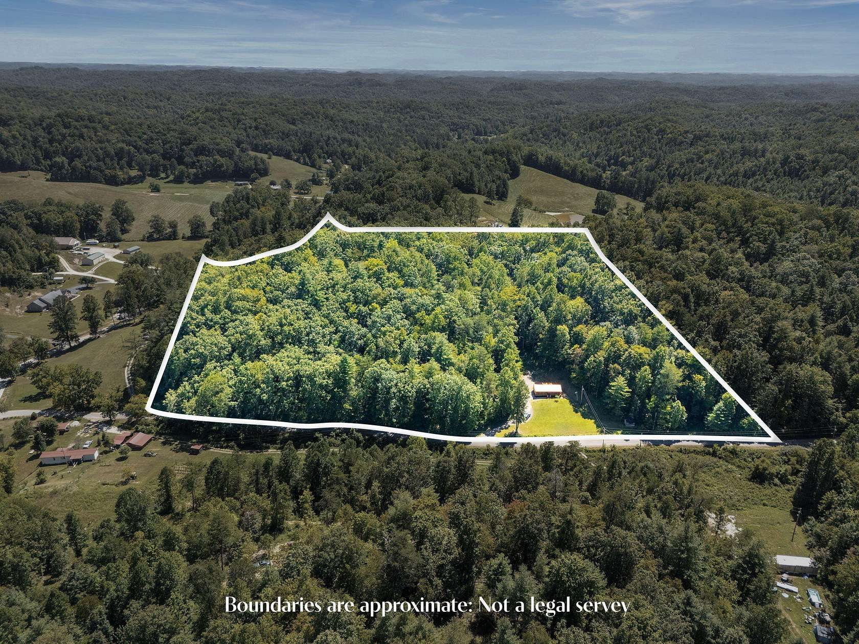 10.4 Acres of Land with Home for Sale in Campton, Kentucky