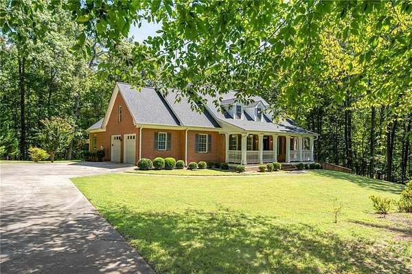 6.77 Acres of Residential Land with Home for Sale in Dawsonville, Georgia