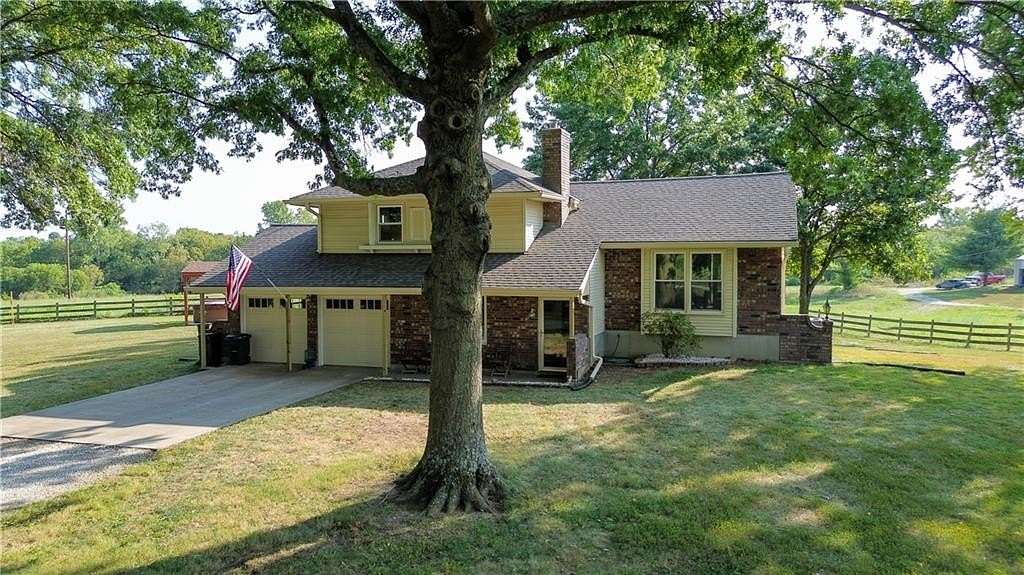 12.5 Acres of Land with Home for Sale in Harrisonville, Missouri