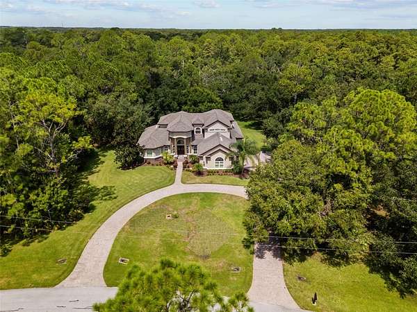 3.72 Acres of Residential Land with Home for Sale in New Port Richey, Florida