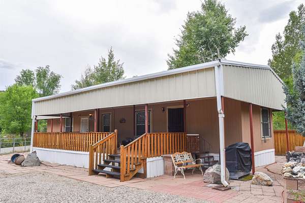 0.63 Acres of Residential Land with Home for Sale in Questa, New Mexico