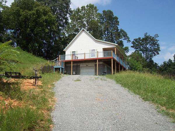 5.72 Acres of Land with Home for Sale in Sneedville, Tennessee