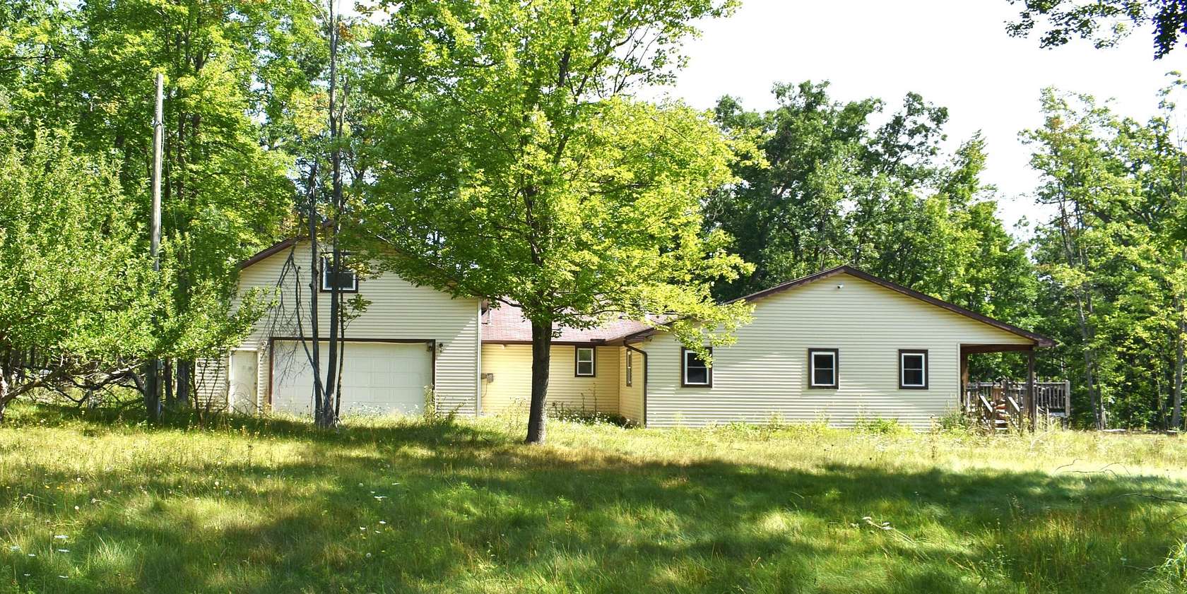 10 Acres of Recreational Land with Home for Sale in Atlanta, Michigan