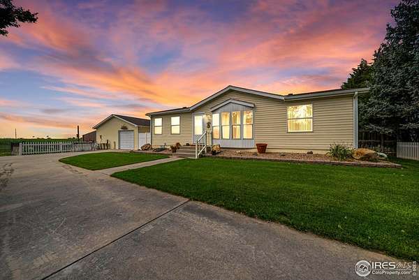 2.79 Acres of Residential Land with Home for Sale in Fort Morgan, Colorado