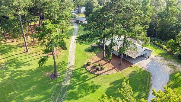 35.3 Acres of Agricultural Land with Home for Sale in Carriere, Mississippi