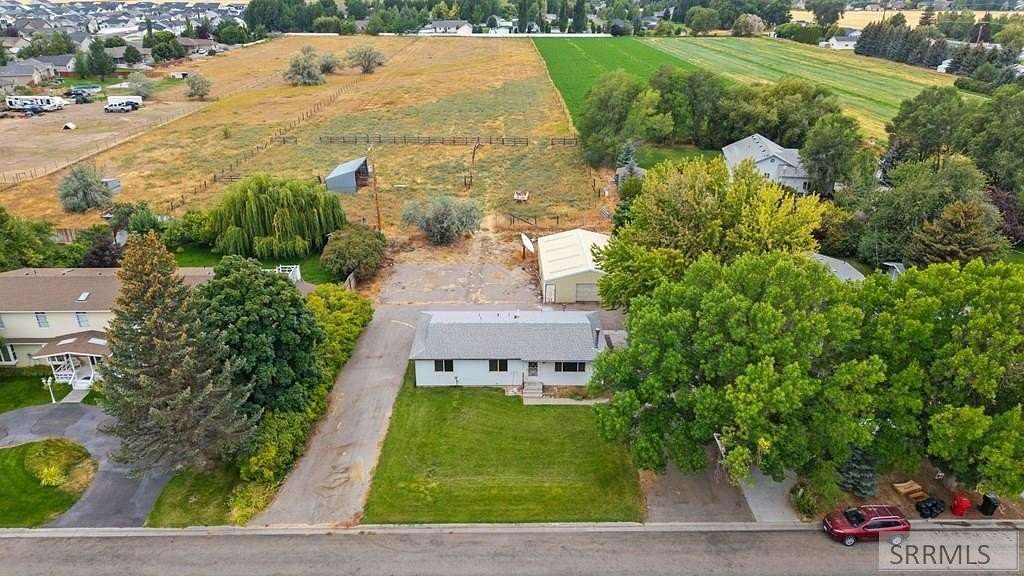 5.55 Acres of Residential Land with Home for Sale in Rigby, Idaho